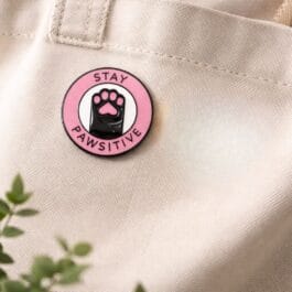 “Stay Pawsitive” Cat Paw Enamel Lapel Pin | Cute Pink Circular Brooch for Pet Lovers