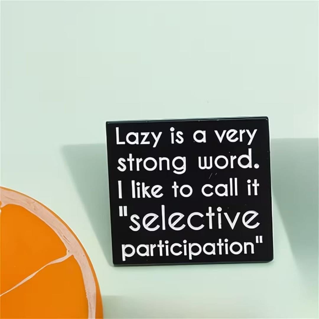 Funny enamel pin black square with white text lazy is a very strong word selective participation
