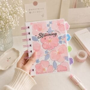 Cute floral spiral notebook with ruled pages and four colorful tabbed dividers