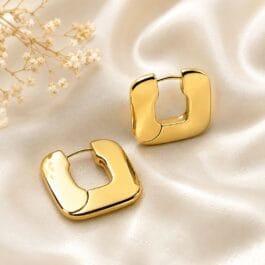 Gold tone square hoop earrings with polished geometric design