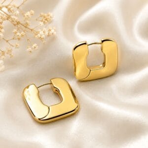 Gold tone square hoop earrings with polished geometric design